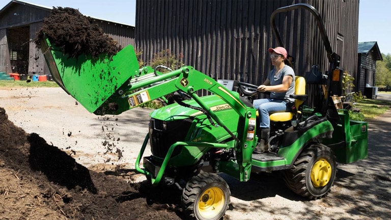 John Deere 1025R in action