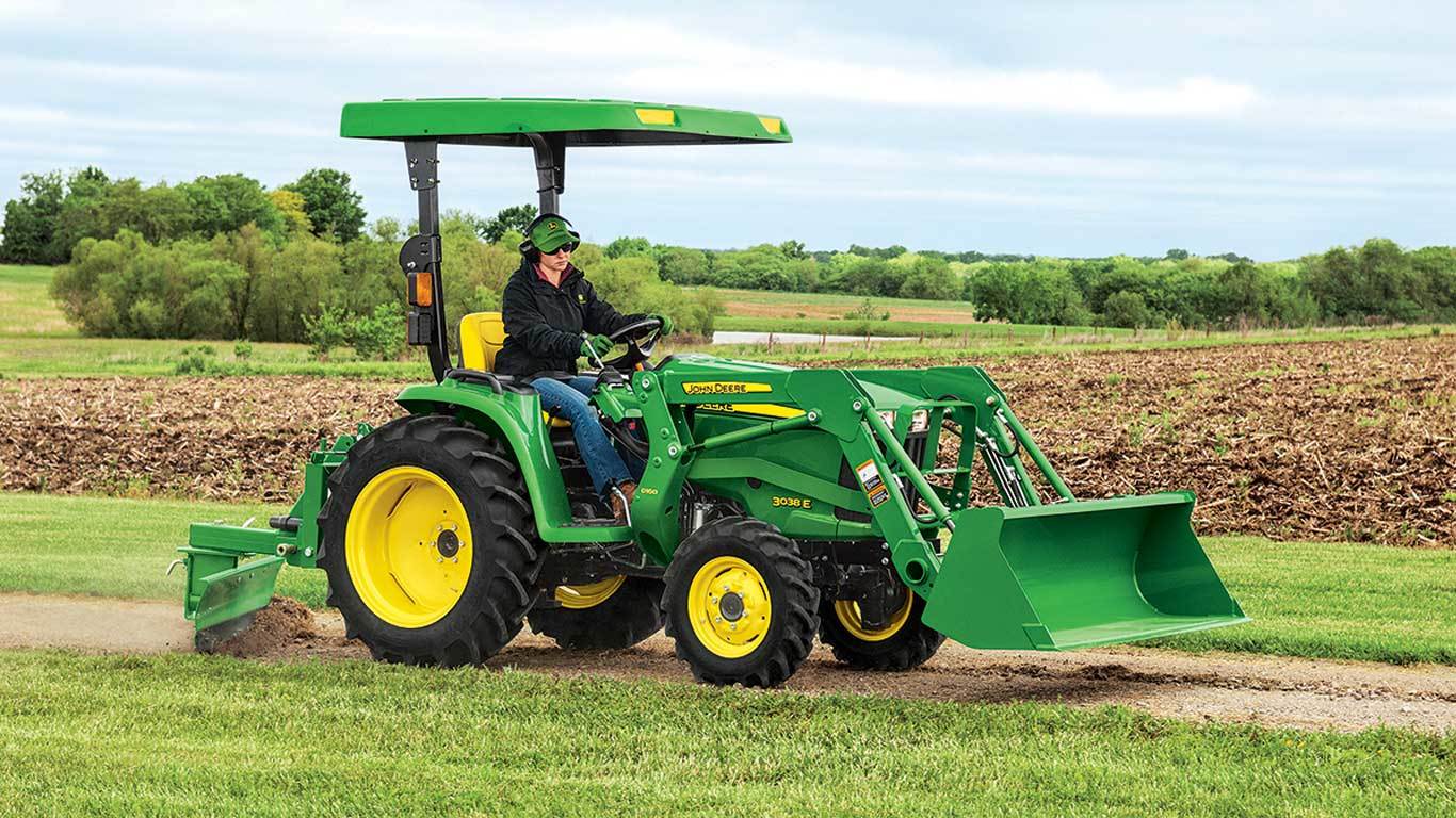 John Deere 3038E in action