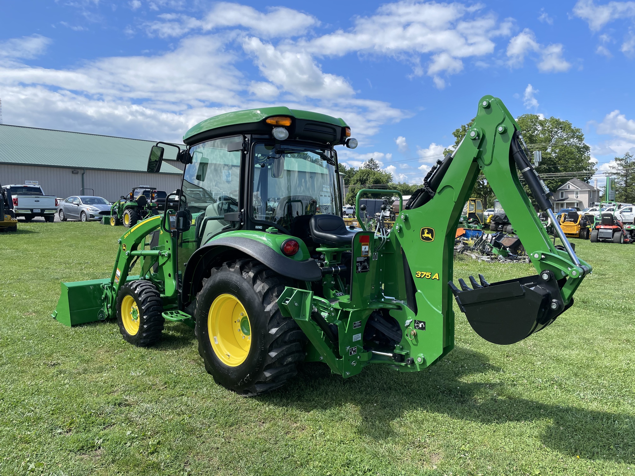 John Deere 3039R in action